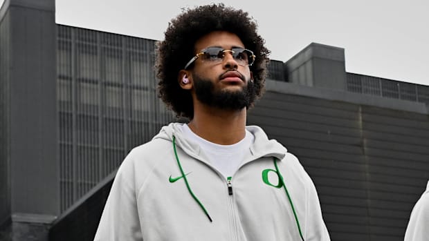 oregon ducks dante moore dan lanning heisman trophy quarterback indiana hoosiers fernando mendoza carson beck john mateer