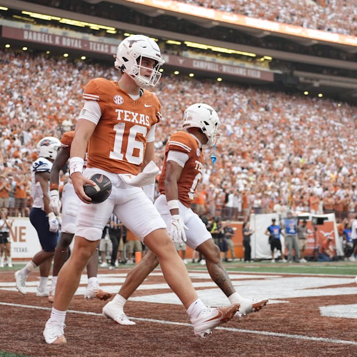 Texas Longhorns quarterback Arch Manning reacts after scoring a touchdown against the Texas-San Antonio Roadrunners