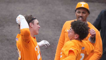 Tennessee catcher/infielder Levi Clark (30) celebrates his grand slam with Tennessee infielder Ariel Antigua (2) at a Tennessee baseball game against Samford, in Lindsey Nelson Stadium at University of Tennessee in Knoxville, Tenn., Saturday, Feb. 22, 2025.