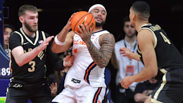 Mar 7, 2025; Champaign, Illinois, USA;  Purdue Boilermakers guard Braden Smith (3) and Trey Kaufman-Renn (4) pressure Illinois Fighting Illini guard Kylan Boswell (4) during the second half at State Farm Center. Mandatory Credit: Ron Johnson-Imagn Images