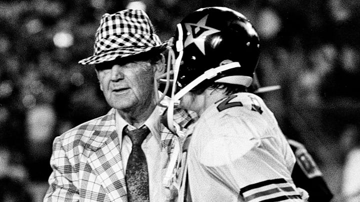 Alabama coach Bear Bryant, left, shakes the hand of Vanderbilt defensive back Steve Curnutte (21) at the end of the game on Sept. 29, 1973. The fifth-ranked Crimson Tide defeated Vanderbilt 44-0 before 34,000 fans at Dudley Field.