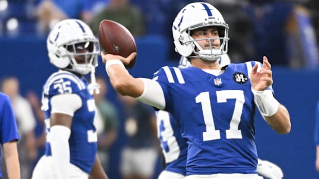Indianapolis Colts quarterback Daniel Jones throws a pass during warmups prior to the game against the Green Bay Packers.