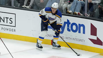 Feb 2, 2025; Salt Lake City, Utah, USA; St. Louis Blues center Brayden Schenn (10) controls the puck during the second period against the Utah Hockey Club at Delta Center. Mandatory Credit: Chris Nicoll-Imagn Images