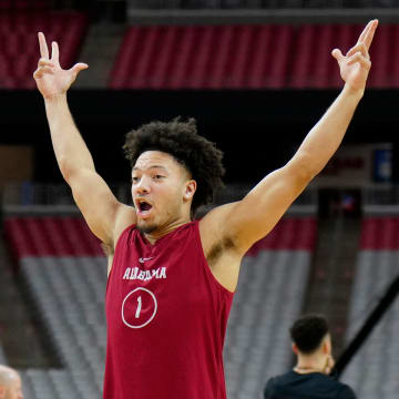 Alabama Crimson Tide guard Mark Sears (1) celebrates during practice for the Final Four at State Farm Stadium on Friday, April 5, 2024.