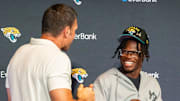The Jacksonville Jaguars’ first-round pick, Colorado Buffaloes wide receiver and defensive back Travis Hunter, right, jokes around with Tony Boselli, Executive Vice President of Football Operations, left, after a press conference Friday, March 25, 2025 at Miller Electric Center in Jacksonville, Fla. [Doug Engle/Florida Times-Union]