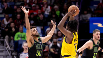 Mar 1, 2024; New Orleans, Louisiana, USA;  Indiana Pacers forward Jarace Walker (5) looks to pass the ball against New Orleans Pelicans forward Jeremiah Robinson-Earl (50) during the second half at Smoothie King Center. Mandatory Credit: Stephen Lew-USA TODAY Sports