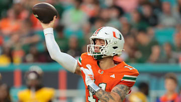Sep 6, 2025; Miami Gardens, Florida, USA; Miami Hurricanes quarterback Carson Beck (11) passes the football against the Bethune-Cookman Wildcats during the first quarter at Hard Rock Stadium. Mandatory Credit: Sam Navarro-Imagn Images