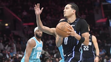 Orlando Magic guard Anthony Black (0) drives to the basket during the first half against the Charlotte Hornets at the Spectrum Center.