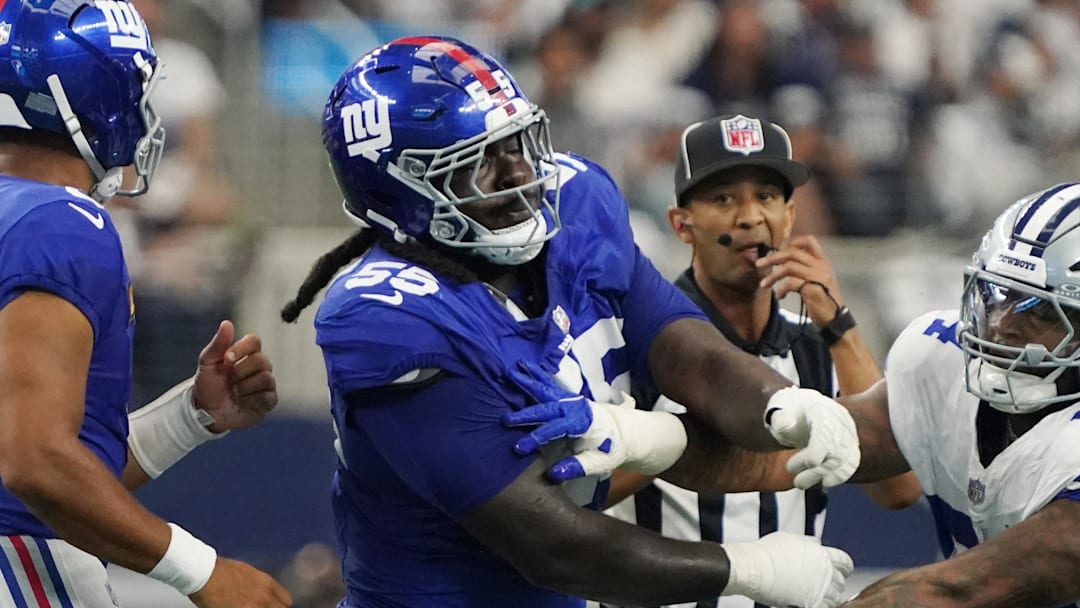 Sep 14, 2025; Arlington, Texas, USA; New York Giants offensive tackle James Hudson III (55) is called for a unnecessary roughness after a play against Dallas Cowboys defensive end Sam Williams (54) during the first quarter at AT&T Stadium. Mandatory Credit: Raymond Carlin III-Imagn Images