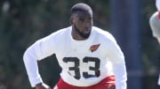 May 10, 2024; Tempe, AZ, USA; Arizona Cardinals running back Trey Benson (33) during rookie minicamp at the teams Tempe Training Facility. Mandatory Credit: Mark J. Rebilas-USA TODAY Sports