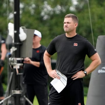 Cincinnati Bengals head coach Zac Taylor watches his team practice during an off-season workout at the practice fields outside of Paycor Stadium Tuesday, May 7, 2024.
