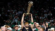 Jun 17, 2024; Boston, Massachusetts, USA; Boston Celtics forward Jayson Tatum (0) celebrates with the Larry O’Brian Trophy after beating the Dallas Mavericks in game five of the 2024 NBA Finals to win the NBA Championship at TD Garden. Mandatory Credit: Peter Casey-USA TODAY Sports