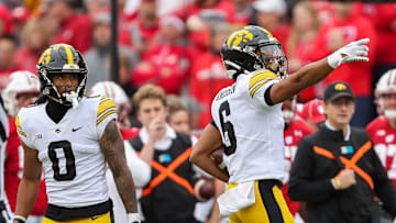 Iowa wide receiver Seth Anderson (6) signals for a first down against Wisconsin on Saturday, October 14, 2023, at Camp Randall Stadium in Madison, Wis. Iowa won the game, 12-6.