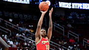 Apr 2, 2024; Houston, TX, USA; McDonald's All American West forward Donavan Freeman (10) shoots a three point basket during the second half against the McDonald's All American East at Toyota Center. Mandatory Credit: Maria Lysaker-Imagn Images