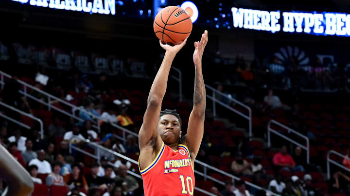 Apr 2, 2024; Houston, TX, USA; McDonald's All American West forward Donavan Freeman (10) shoots a three point basket during the second half against the McDonald's All American East at Toyota Center. Mandatory Credit: Maria Lysaker-Imagn Images