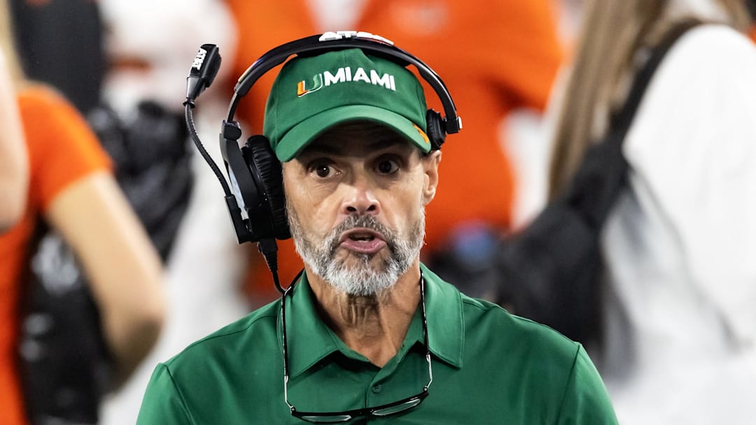 Jan 8, 2026; Glendale, AZ, USA; Miami Hurricanes offensive line coach Alex Mirabal against the Mississippi Rebels during the 2026 Fiesta Bowl and semifinal game of the College Football Playoff at State Farm Stadium. Mandatory Credit: Mark J. Rebilas-Imagn Images