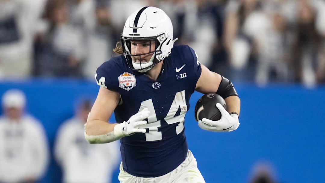 Dec 31, 2024; Glendale, AZ, USA; Penn State Nittany Lions tight end Tyler Warren (44) against the Boise State Broncos in the Fiesta Bowl at State Farm Stadium. Mandatory Credit: Mark J. Rebilas-Imagn Images