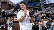 Vanderbilt quarterback Diego Pavia prepares to throw out a ceremonial first pitch before a game between Vanderbilt and Arkansas at Hawkins Field in Nashville, Tenn., Friday, March 28, 2025.
