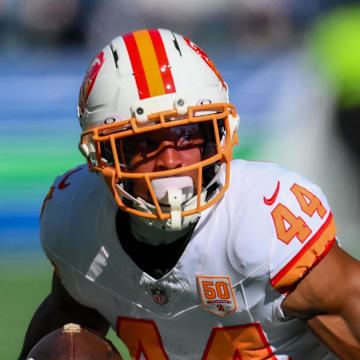 Oct 5, 2025; Seattle, Washington, USA; Tampa Bay Buccaneers running back Sean Tucker (44) runs after a catch against the Seattle Seahawks during the first half at Lumen Field. Mandatory Credit: Steven Bisig-Imagn Images