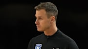 Apr 5, 2025; San Antonio, TX, USA; Duke Blue Devils head coach Jon Scheyer looks on against the Houston Cougars during the second half in the semifinals of the men's Final Four of the 2025 NCAA Tournament at the Alamodome. Mandatory Credit: Bob Donnan-Imagn Images