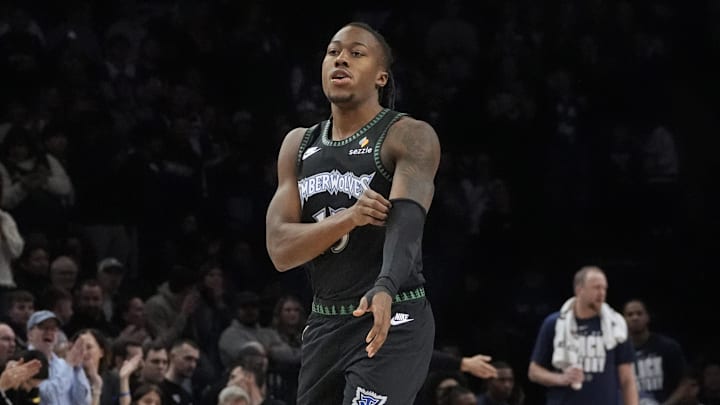 Feb 8, 2026; Minneapolis, Minnesota, USA; Minnesota Timberwolves guard Ayo Dosunmu (13) enters the game for the first time as a member of the team and receives a standing ovation as he readies to play the Los Angeles Clippers in the first quarter at Target Center. Mandatory Credit: Bruce Kluckhohn-Imagn Images