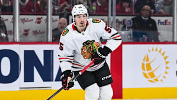 Apr 14, 2025; Montreal, Quebec, CAN; Chicago Blackhawks defenseman Artyom Levshunov (55) plays the puck against the Montreal Canadiens in the first period at Bell Centre. Mandatory Credit: David Kirouac-Imagn Images