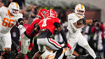Tennessee running back Peyton Lewis (27) runs with the ball during a college football game between Tennessee and Georgia at Sanford Stadium in Athens, Ga., on Saturday, November 16, 2024.