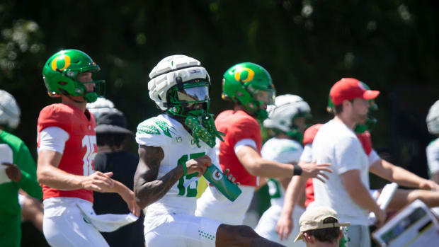 Oregon wide receiver Tez Johnson works out during the Ducks’ fall camp