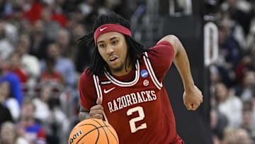 Mar 20, 2025; Providence, RI, USA;  Arkansas Razorbacks guard Boogie Fland (2) controls the ball during the second half against the Kansas Jayhawks at Amica Mutual Pavilion. Mandatory Credit: Eric Canha-Imagn Images