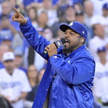 Oct 26, 2024; Los Angeles, California, USA; Recording artist Ice Cube performs on field before game two between the Los Angeles Dodgers and the New York Yankees in the 2024 MLB World Series at Dodger Stadium. Mandatory Credit: Jayne Kamin-Oncea-Imagn Images