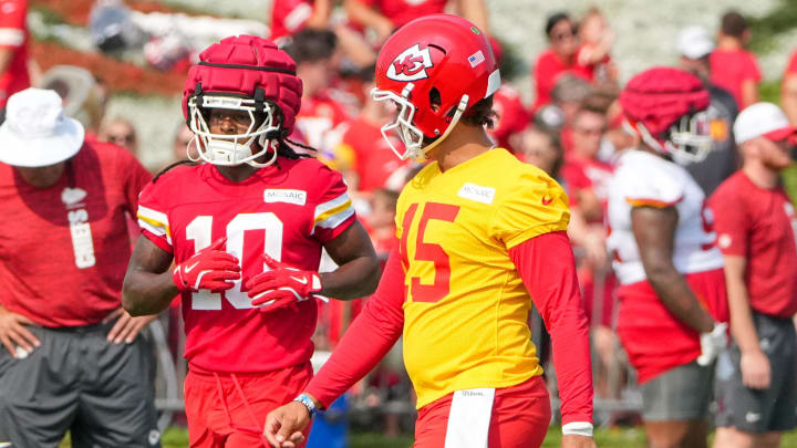 Jul 22, 2024; St. Joseph, MO, USA; Kansas City Chiefs running back Isiah Pacheco (10) and quarterback Patrick Mahomes (15) walk to the line during training camp at Missouri Western State University. Mandatory Credit: Denny Medley-USA TODAY Sports