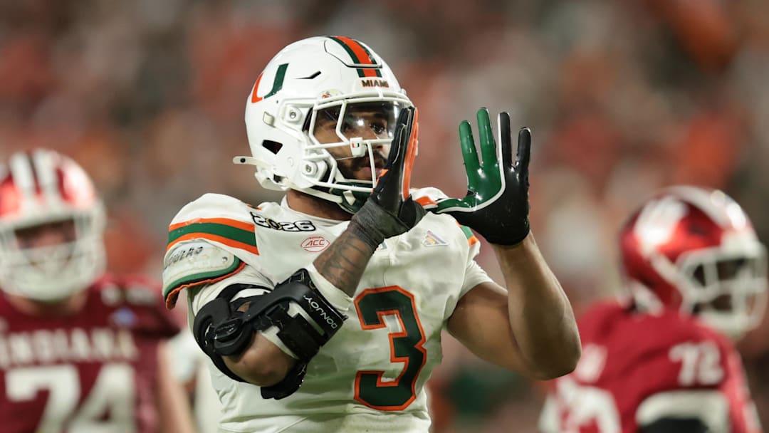 Jan 19, 2026; Miami Gardens, FL, USA; Miami Hurricanes defensive lineman Akheem Mesidor (3) celebrates after a sack against the Indiana Hoosiers in the third quarter during the College Football Playoff National Championship game at Hard Rock Stadium. Mandatory Credit: Sam Navarro-Imagn Images