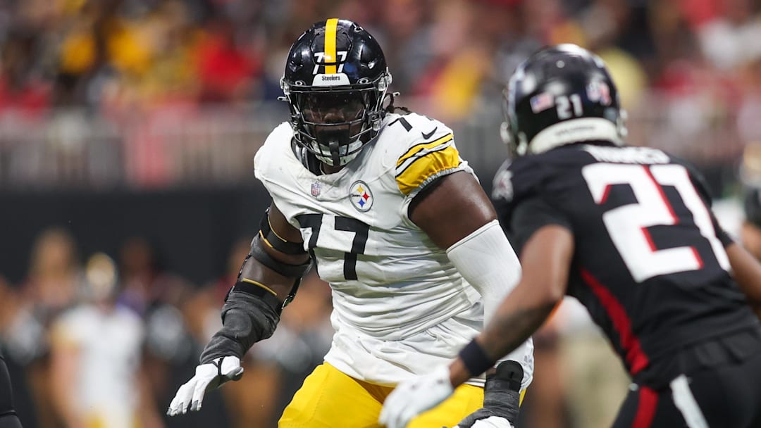 Sep 8, 2024; Atlanta, Georgia, USA; Pittsburgh Steelers offensive tackle Broderick Jones (77) blocks against the Atlanta Falcons in the fourth quarter at Mercedes-Benz Stadium. Mandatory Credit: Brett Davis-Imagn Images
