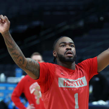 Mar 28, 2024; Dallas, TX, USA; Houston Cougars guard Jamal Shead (1) reacts while going through drills during practice at American Airline Center. Mandatory Credit: Tim Heitman-USA TODAY Sports