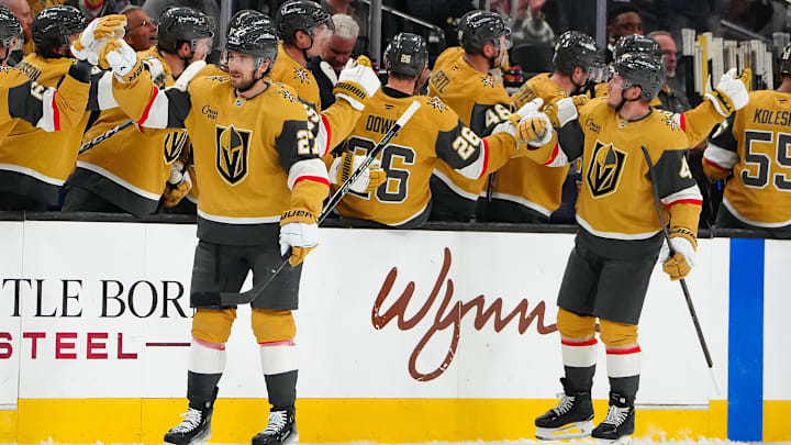 Shea Theodore and Ivan Barbashev celebrate the former's second-period equalizer with the VGK bench.