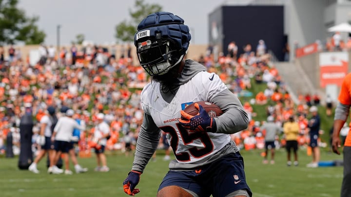 Jul 26, 2024; Englewood, CO, USA; Denver Broncos running back Samaje Perine (25) during training camp at Broncos Park Powered by CommonSpirit. Mandatory Credit: Isaiah J. Downing-USA TODAY Sports