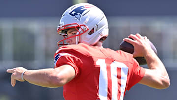 Jul 28, 2025; Foxborough, MA, USA; New England Patriots quarterback Drake Maye (10) throws a pass during training camp at Gillette Stadium. Mandatory Credit: Eric Canha-Imagn Images