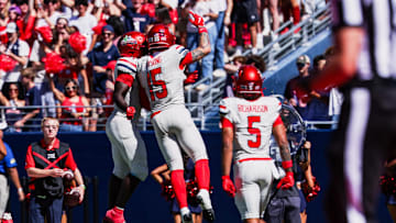 Oct 4, 2025; Tucson, Arizona, USA; Arizona Wildcats wide receiver Luke Wysong (15) celebrates after scoring a touchdown against the Oklahoma State Cowboys during the second quarter at Arizona Stadium. Mandatory Credit: Aryanna Frank-Imagn Images