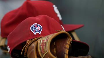 Sep 11, 2023; Baltimore, Maryland, USA;  A detailed view of the 9/11 ribbon on a St. Louis Cardinals hat in the dugout before the game against the Baltimore Orioles at Oriole Park at Camden Yards. Mandatory Credit: Tommy Gilligan-Imagn Images