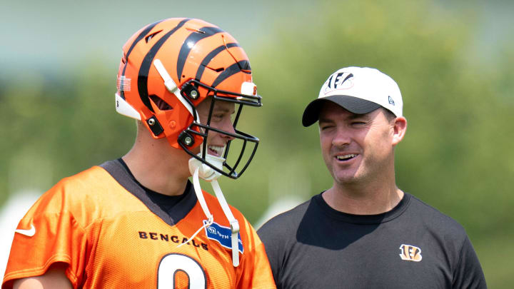 Cincinnati Bengals quarterback Joe Burrow (9) talks with Cincinnati Bengals head coach Zac Taylor during Cincinnati Bengals training camp in Cincinnati on Friday, July 26, 2024.