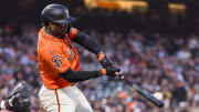 Giants outfielder Jorge Soler hits a ball