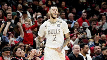 Jan 4, 2025; Chicago, Illinois, USA; Chicago Bulls guard Lonzo Ball (2) reacts after making a three point basket against the New York Knicks during the second half at United Center. Mandatory Credit: David Banks-Imagn Images