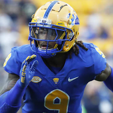 Oct 12, 2024; Pittsburgh, Pennsylvania, USA;  Pittsburgh Panthers defensive back Kyle Louis (9) pass rushes at he line of scrimmage against the California Golden Bears during the third quarter at Acrisure Stadium. Mandatory Credit: Charles LeClaire-Imagn Images