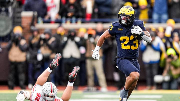 Michigan running back Jordan Marshall (23) runs against Ohio State during the first half at Michigan Stadium in Ann Arbor on Saturday, Nov. 29, 2025.