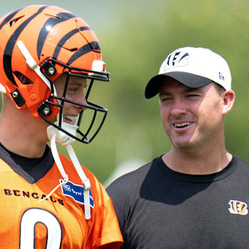 Cincinnati Bengals quarterback Joe Burrow (9) talks with Cincinnati Bengals head coach Zac Taylor during Cincinnati Bengals training camp in Cincinnati on Friday, July 26, 2024.