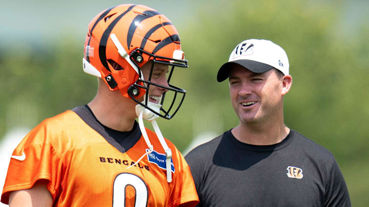 Cincinnati Bengals quarterback Joe Burrow (9) talks with Cincinnati Bengals head coach Zac Taylor during Cincinnati Bengals training camp in Cincinnati on Friday, July 26, 2024.