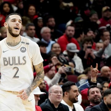 Jan 4, 2025; Chicago, Illinois, USA; Chicago Bulls guard Lonzo Ball (2) reacts after making a three point basket against the New York Knicks during the second half at United Center. Mandatory Credit: David Banks-Imagn Images