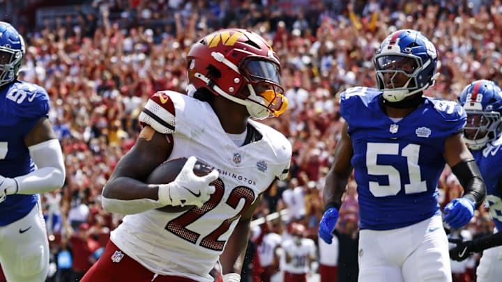 Washington Commanders running back Jacory Croskey-Merritt scores a touchdown. Washington Commanders running back Jacory Croskey-Merritt scores a touchdown.