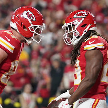 Oct 27, 2025; Kansas City, Missouri, USA; Kansas City Chiefs running back Kareem Hunt (29) celebrates after scoring a touchdown against the Washington Commanders with tight end Travis Kelce (87) during the third quarter of the game at GEHA Field at Arrowhead Stadium. Mandatory Credit: Denny Medley-Imagn Images