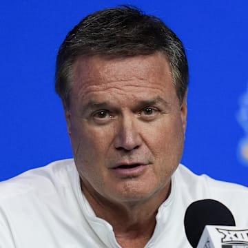 Oct 23, 2024; Kansas City, MO, USA; Kansas Jayhawks head coach Bill Self talks to media during the Big 12 Men’s Basketball Media Day at T-Mobile Center. Mandatory Credit: Jay Biggerstaff-Imagn Images